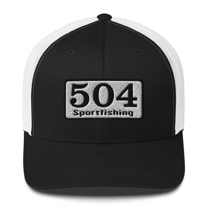 A Black and White trucker Cap with"504 Sportfishing" written on the front.